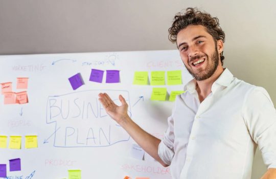 Man Presenting Business Plan - Strategic Planning and Motivation